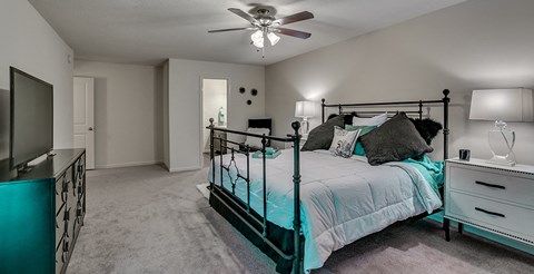 us census designated place bedroom with ample storage and a large bed