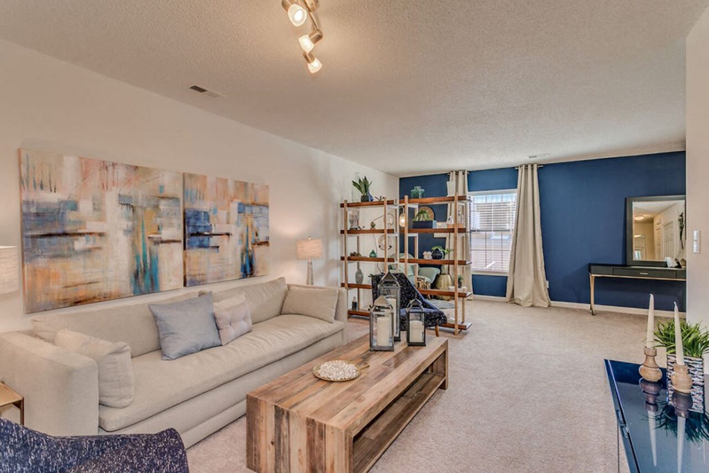 a living room with a couch and a coffee table