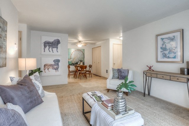 Living Room With Dining Area at Mountain High Apartments, Gresham, OR