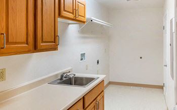 Laundry room with utility sink*