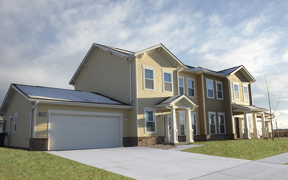 a house with a garage and a driveway