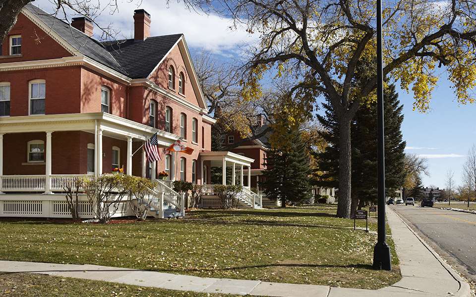 a row of houses on the side of a street