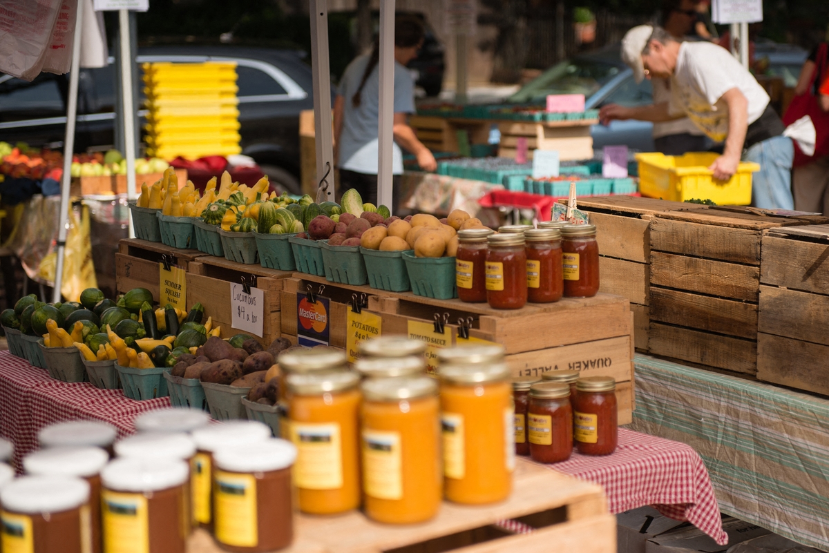 a display of jars of honey at a market