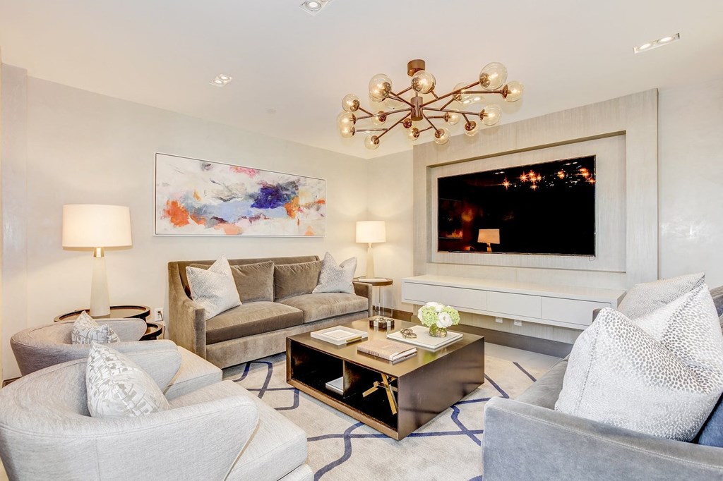 a living room with couches and a coffee table