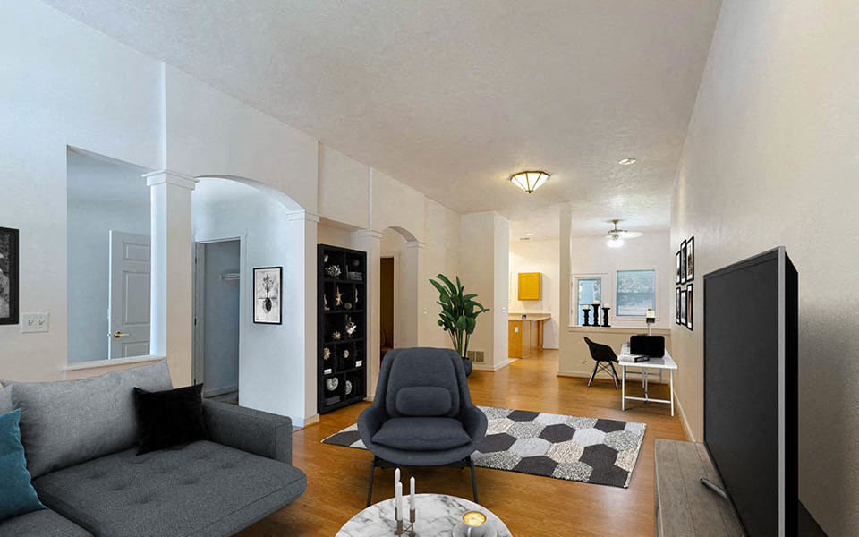 a living room with a couch and a chair