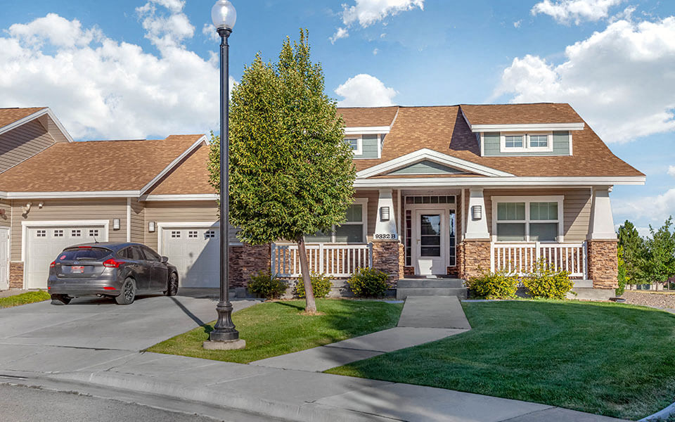 a house with a car parked in front of it