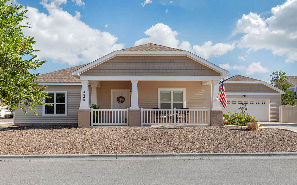 a house with an flag in front of it