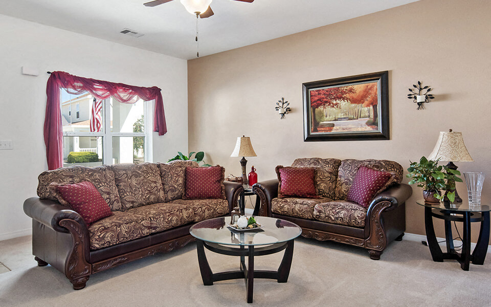 a living room with couches and a coffee table
