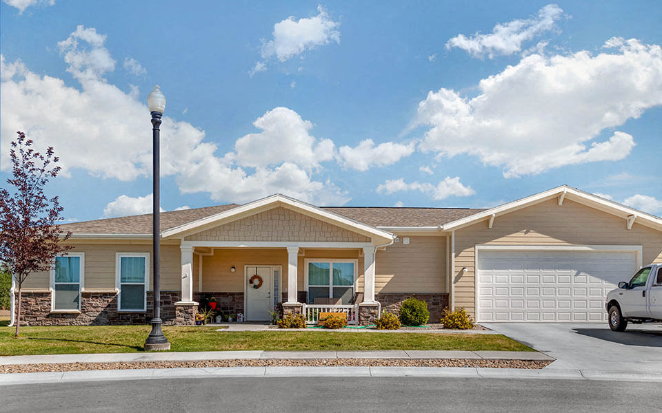 a house with a car parked in front of it