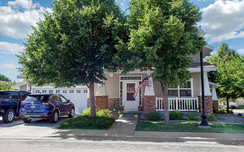 a house with a car parked in front of it