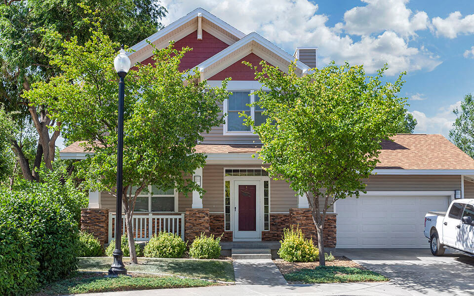 a house with a street light in front of it