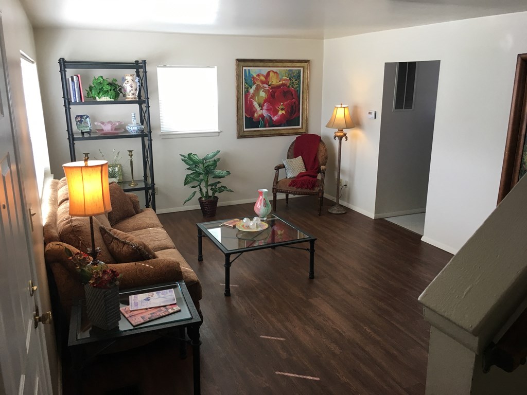 a living room with a couch and a table