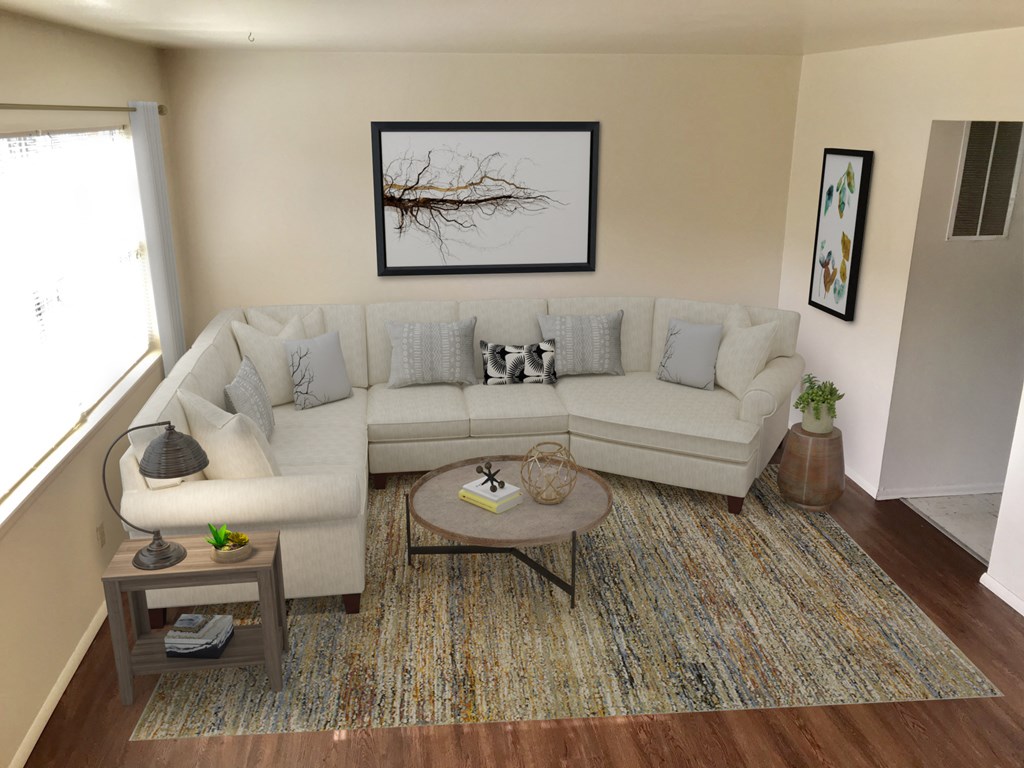 a living room with a couch and a coffee table