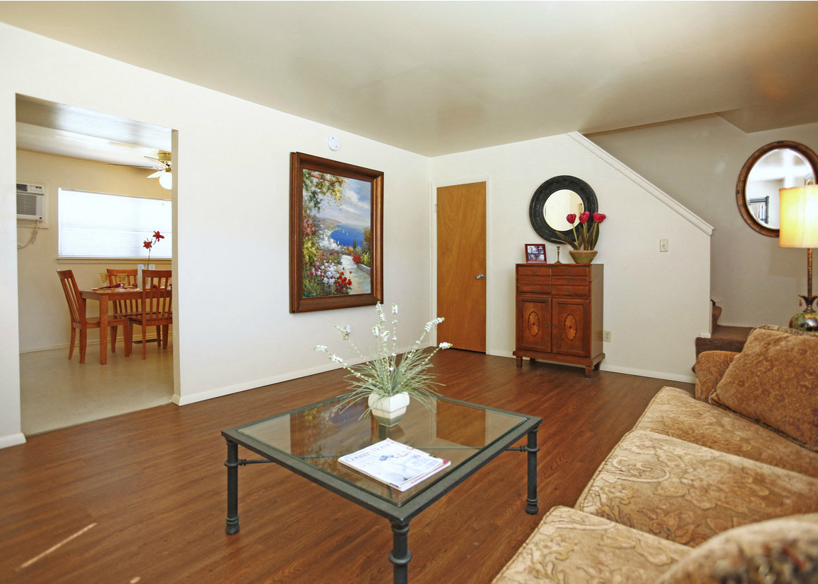 a living room with a couch and a coffee table