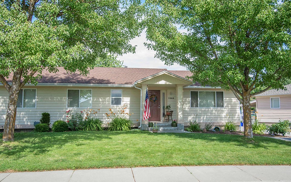 a house with an flag on the front of it