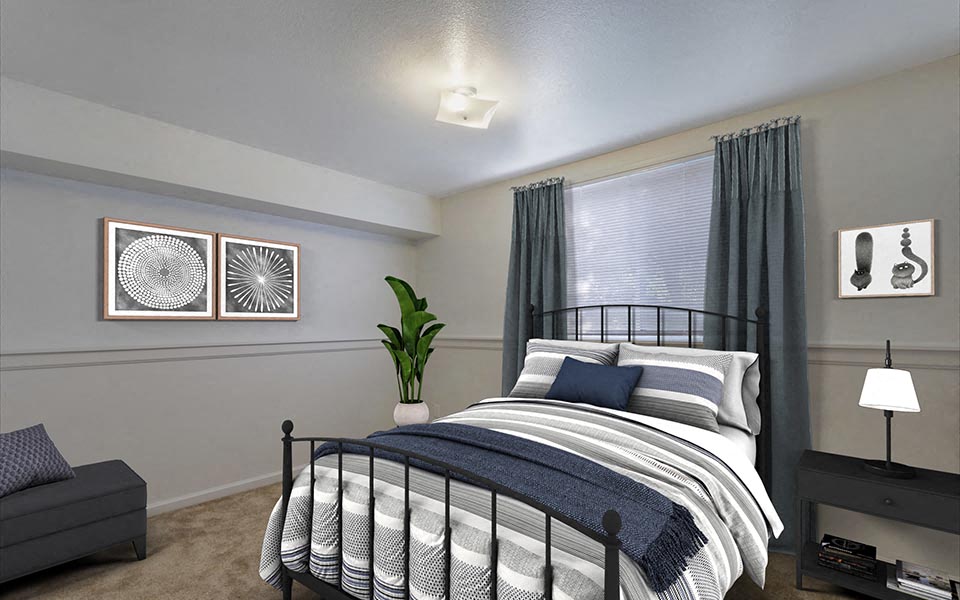 a bedroom with a bed and a window