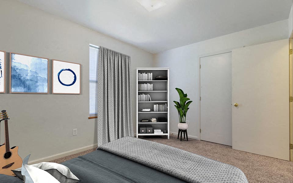 a bedroom with a bed and a guitar