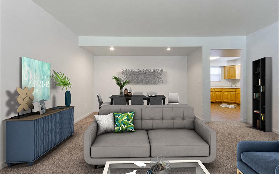 a living room with a couch and a table