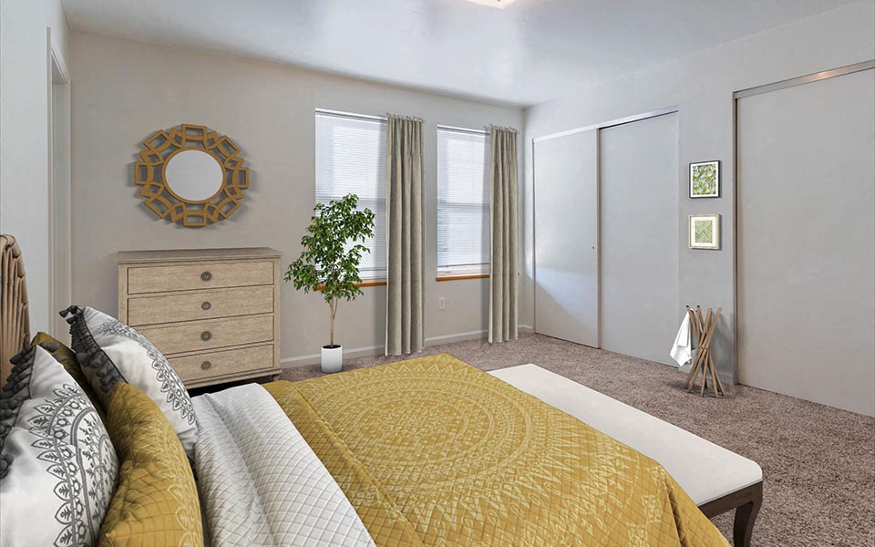 a bedroom with a bed and a dresser