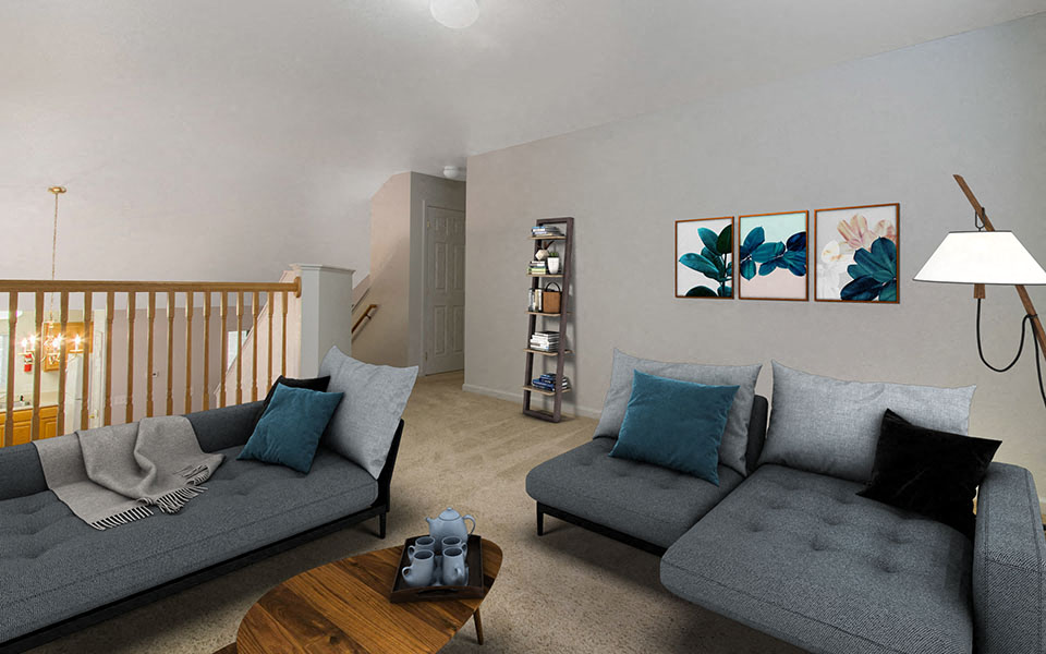 a living room with couches and a table