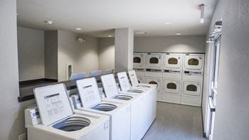 Laundry Center at Timberglen Apartments in Dallas, TX