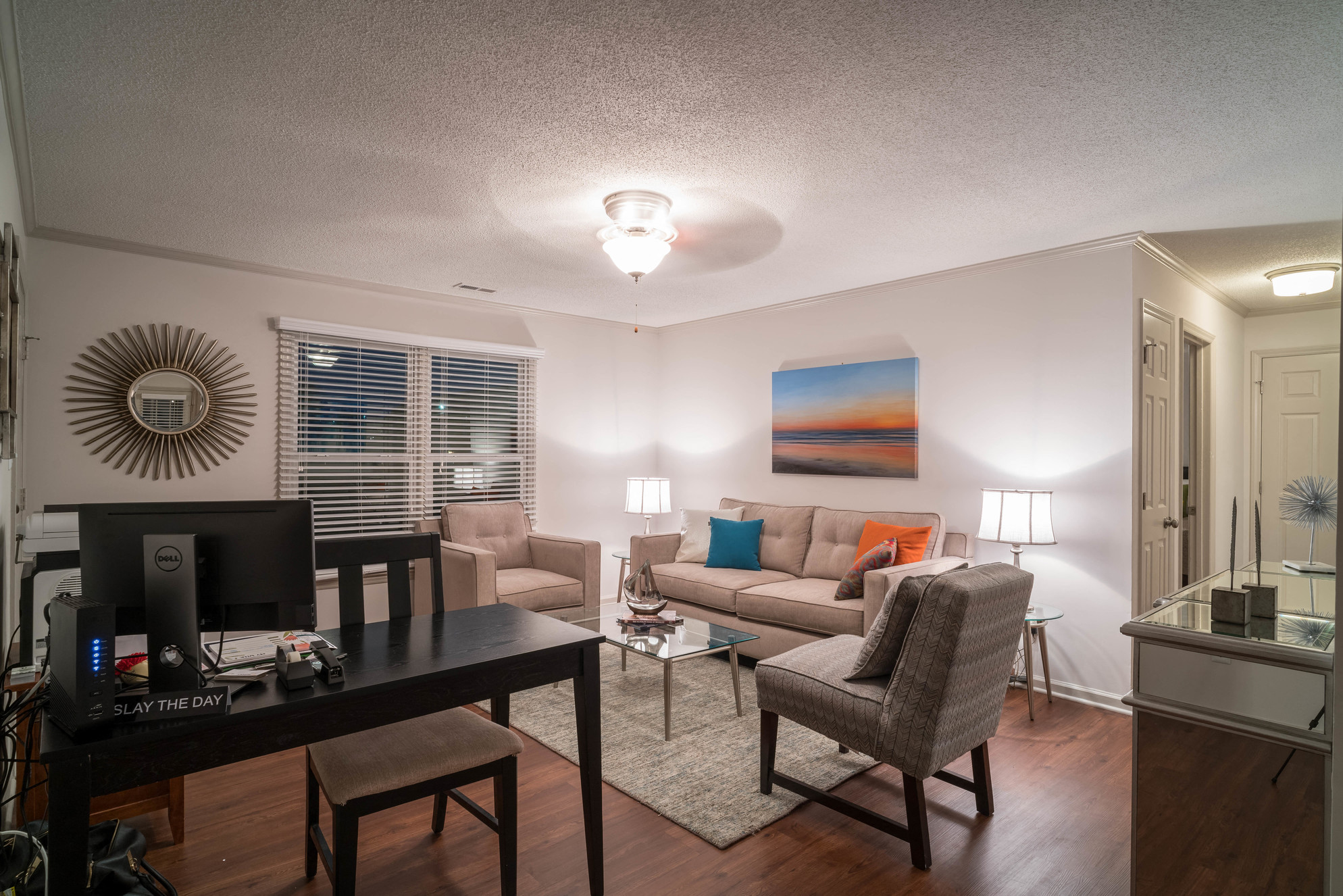 a living room with a couch and a table