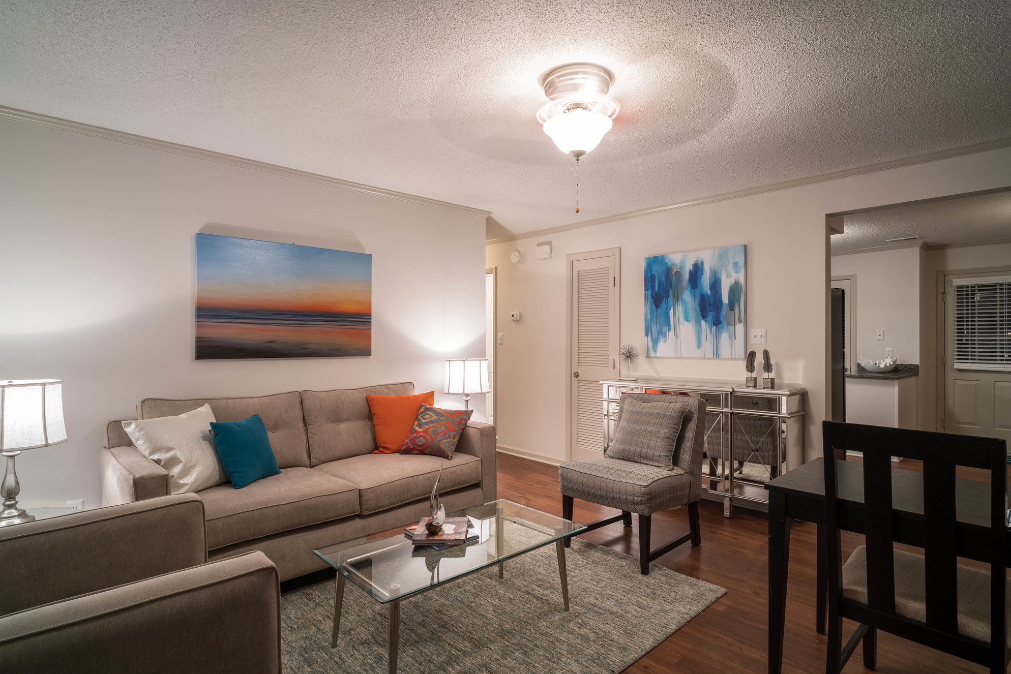 a living room with a couch and a table