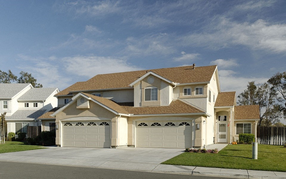 a house with a garage and a driveway