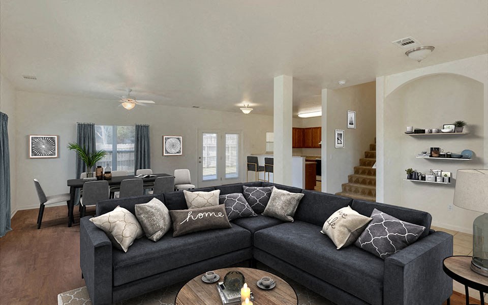 a living room with a couch and a table