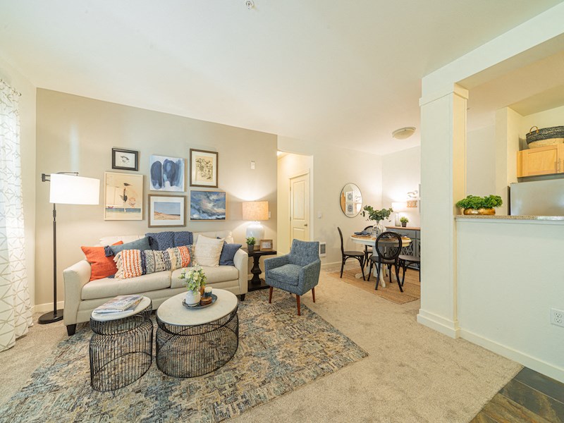 a living room with a couch and a table