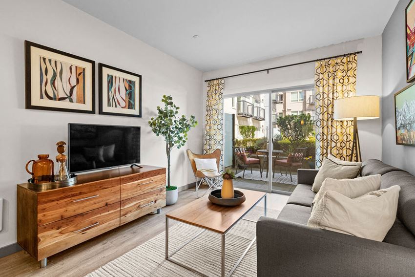 a living room with a couch and a tv