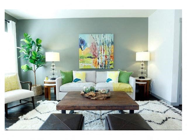 a living room with a couch and a table