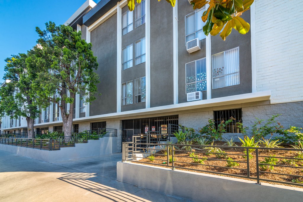 Building exterior with gated, interior parking