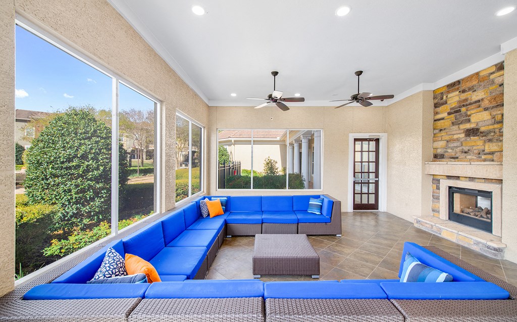 the preserve at ballantyne commons living room with couches and a fireplace