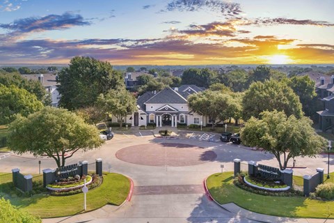 an aerial view of a neighborhood with houses and trees
