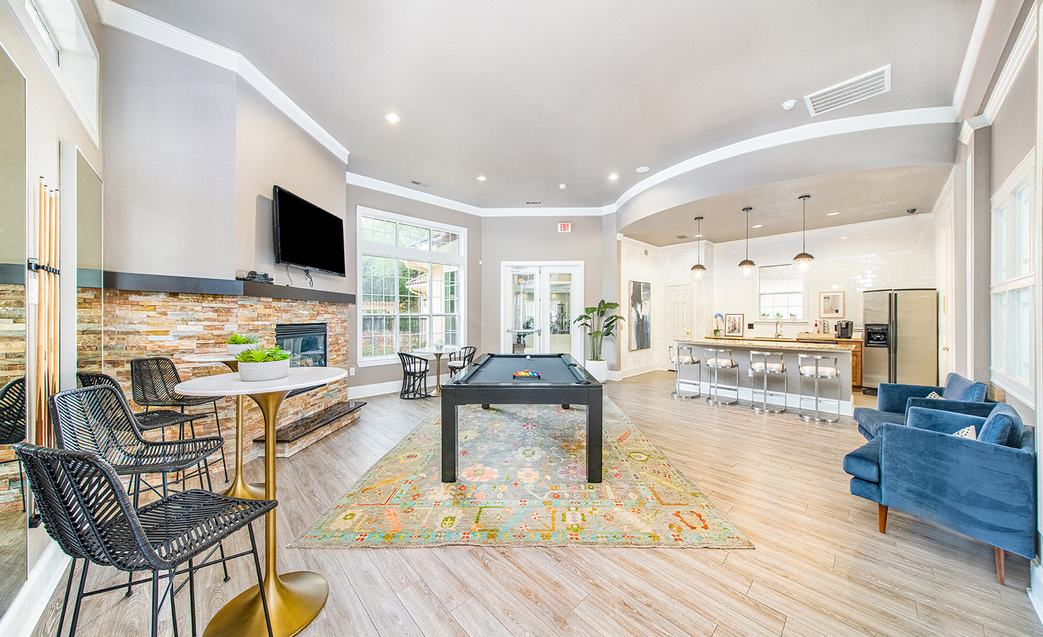 the preserve at ballantyne commons clubhouse with pool table and living room