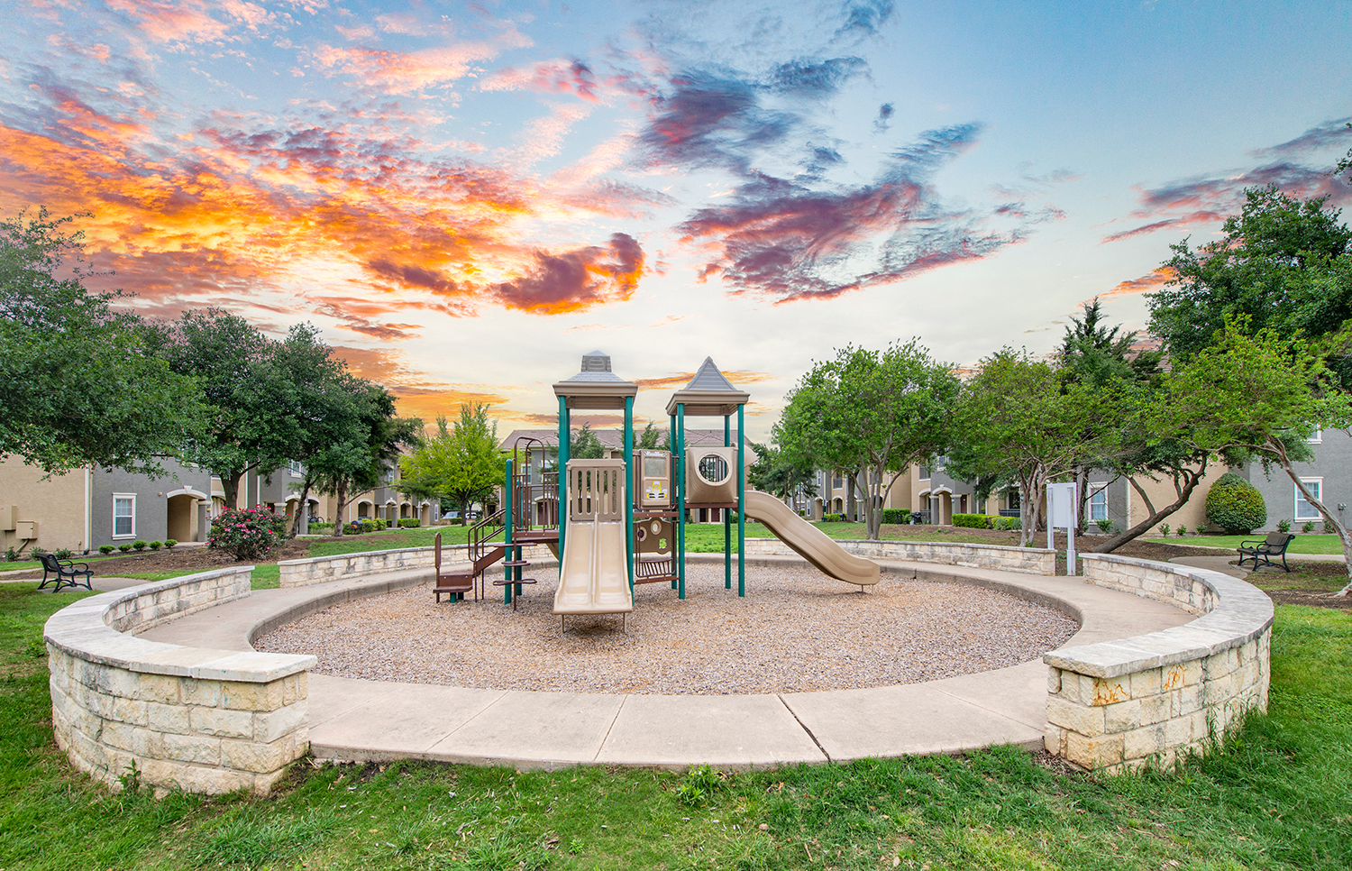 the preserve at ballantyne commons park playground at sunset