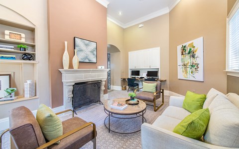 a living room with couches and a fireplace