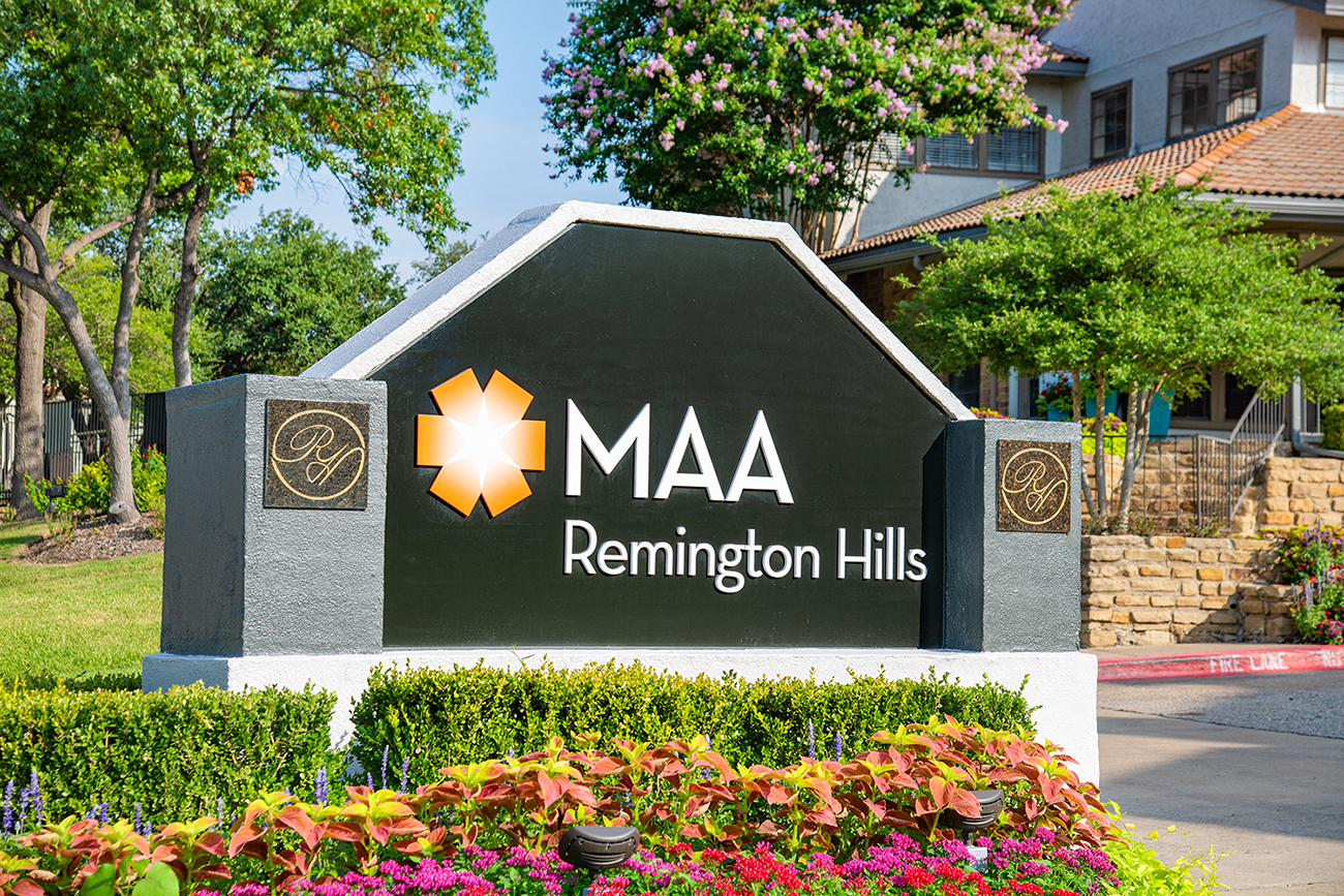 a sign for the mia reunion hills campus in front of a building