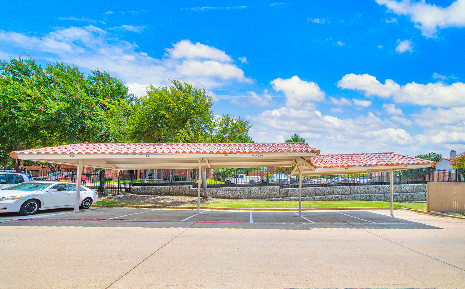 a parking lot with a covered parking lot