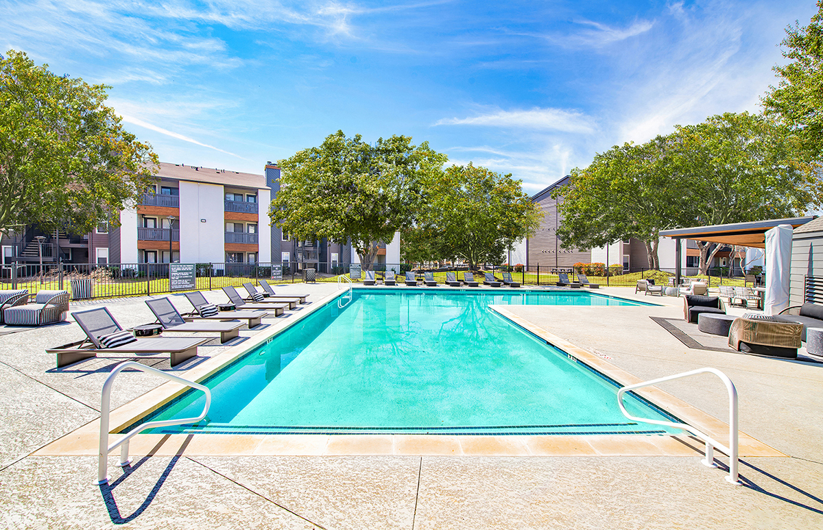 our apartments have a resort style pool with lounge chairs