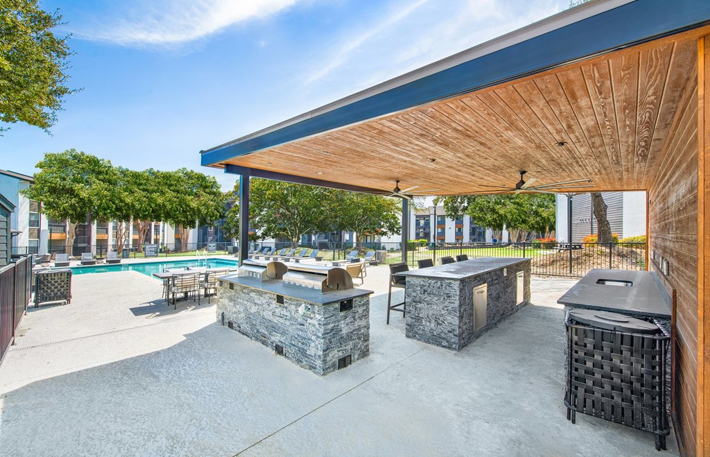 the reserve at city center spacious patio with grills and a pool