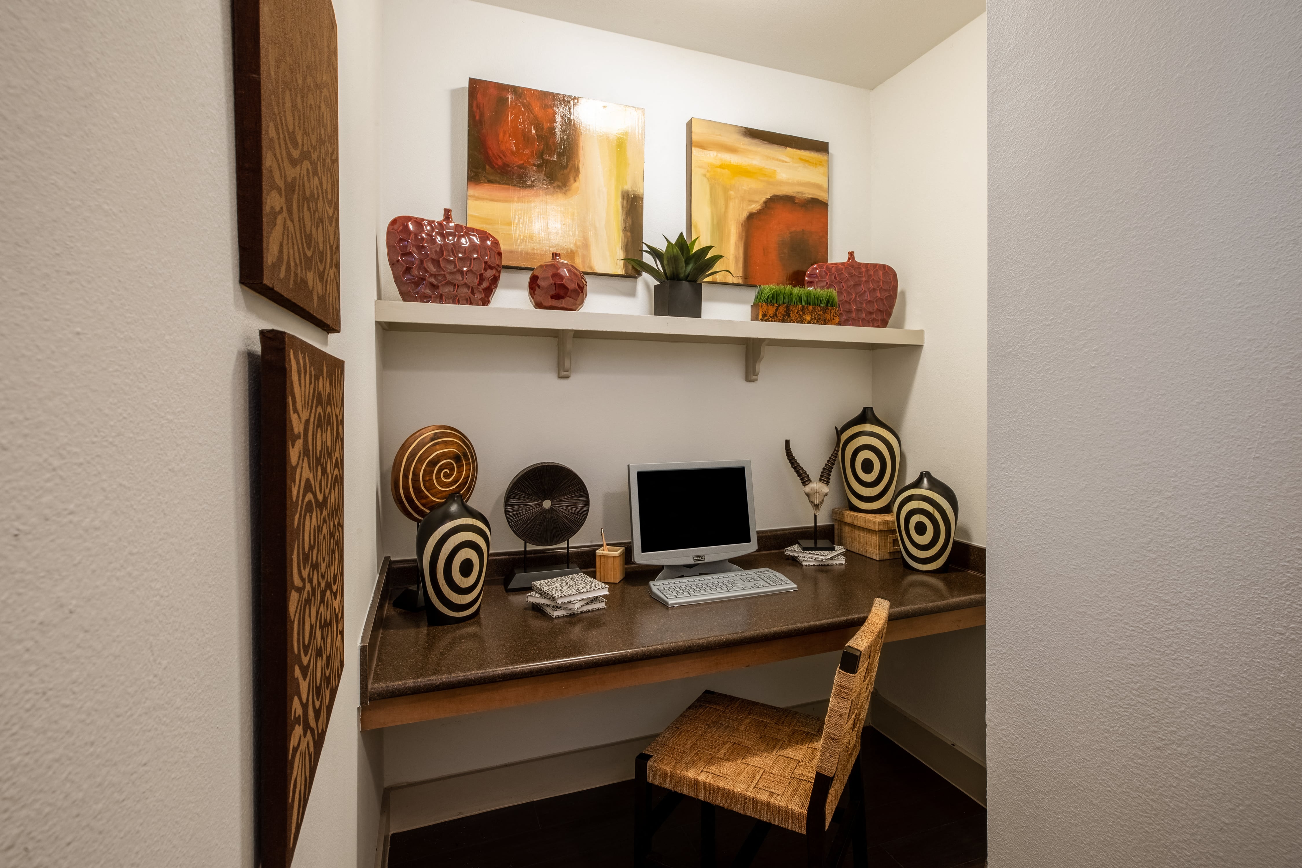 a home office with a desk and a computer