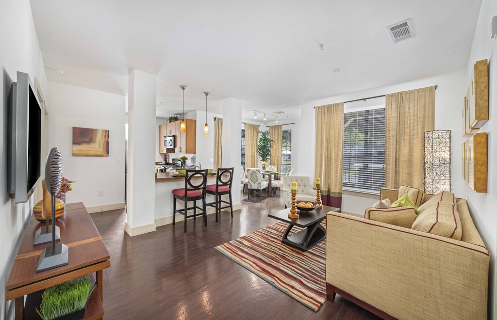 a living room with a couch and a table