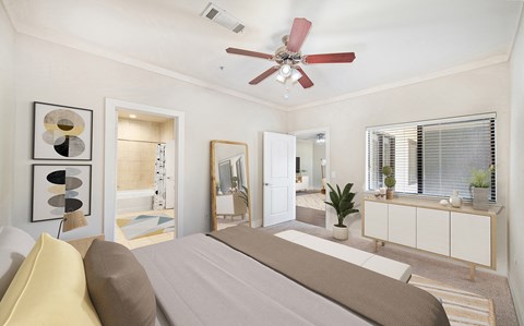 a bedroom with a bed and a ceiling fan