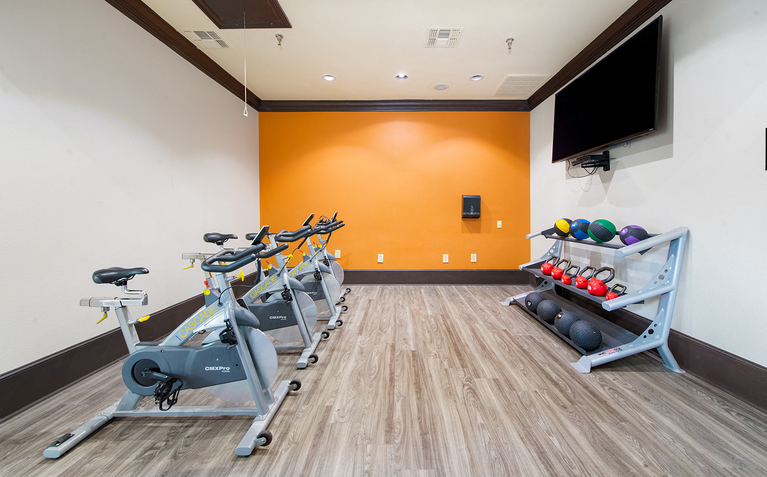 the gym at the flats at big tex apartments