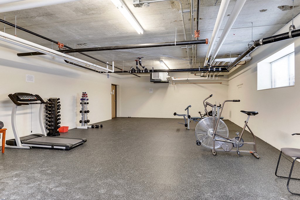 the gym at the flats at big tex apartments