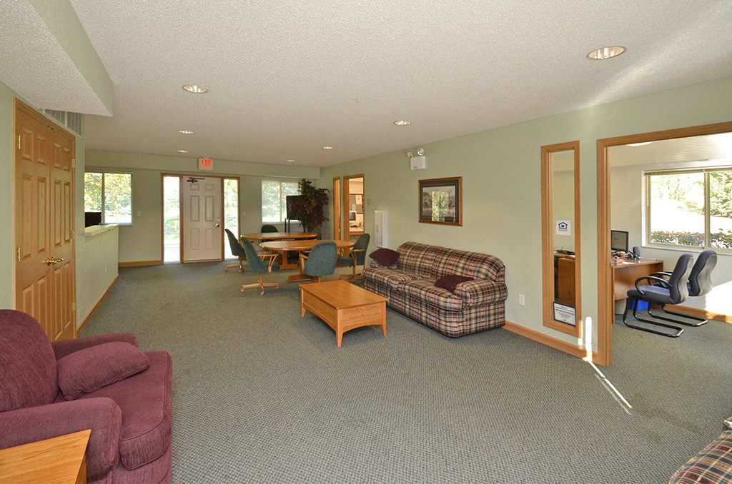 a living room with a couch and a table