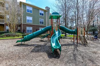 Children Play area at Alden Place too! Slides, Climbing Equipment and Bike Parking at Alden Place at South Square Apartments, Durham, NC 27707