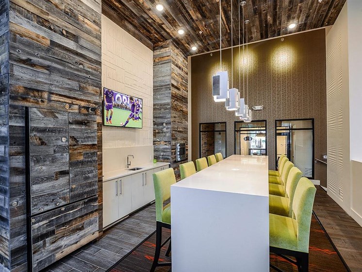 Clubhouse Kitchen and Bar with Flat Screen TV for Resident Entertainment Use at EOS Apartments, Orlando, FL 32826